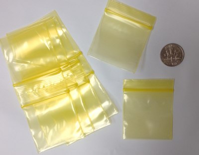 1.5 x 1.5, 2 Mil Yellow Tint Reclosable Bags