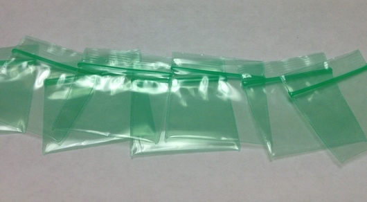 1.5 x 1.5, 2 Mil Green Tint Reclosable Bags